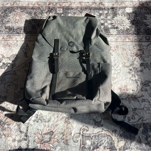 Stylish Gray Backpack with Buckle Straps